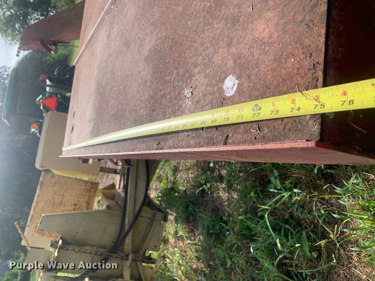 image for item DM7977 New Holland  1033 bale accumulator