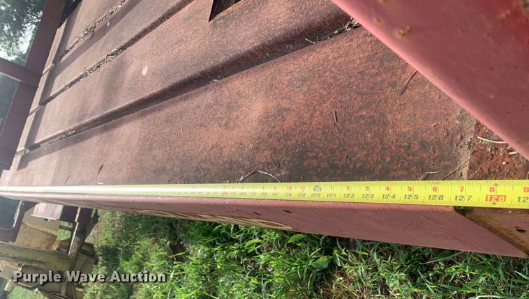 image for item DM7977 New Holland  1033 bale accumulator