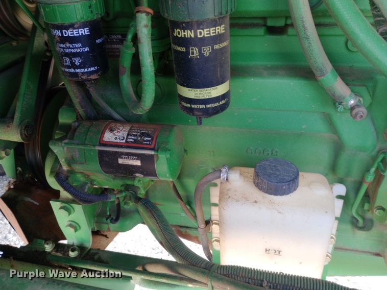 image for item NY9382 2005 John Deere 7460 cotton stripper