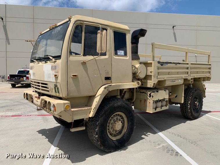 image for item DM7965 1994 Stewart & Stevenson M1078 flatbed truck