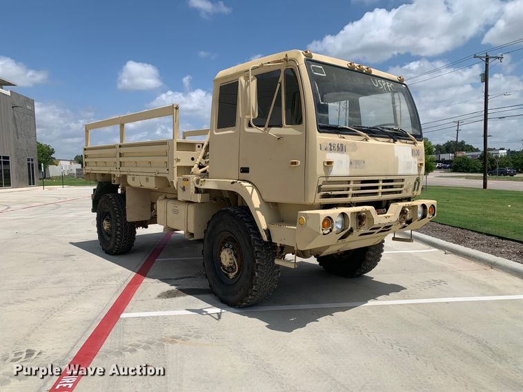 image for item DM7965 1994 Stewart & Stevenson M1078 flatbed truck