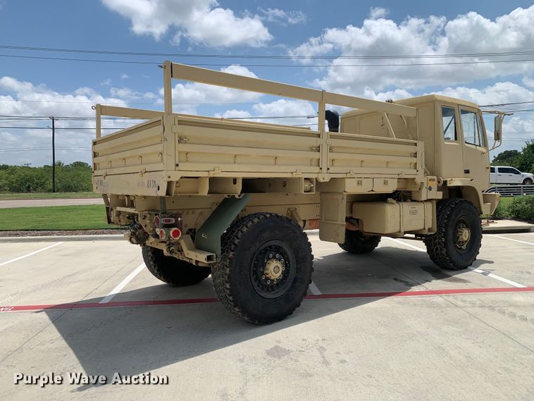 image for item DM7965 1994 Stewart & Stevenson M1078 flatbed truck