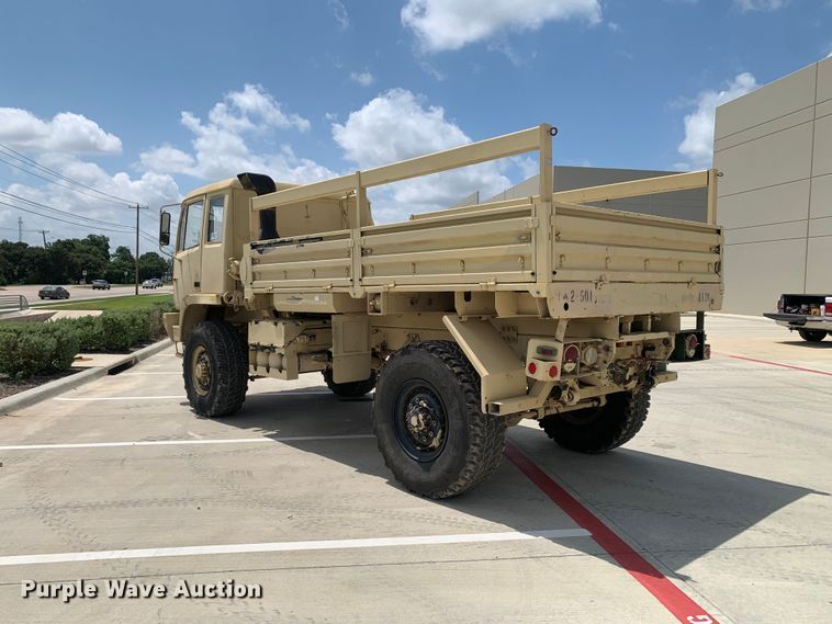 image for item DM7965 1994 Stewart & Stevenson M1078 flatbed truck