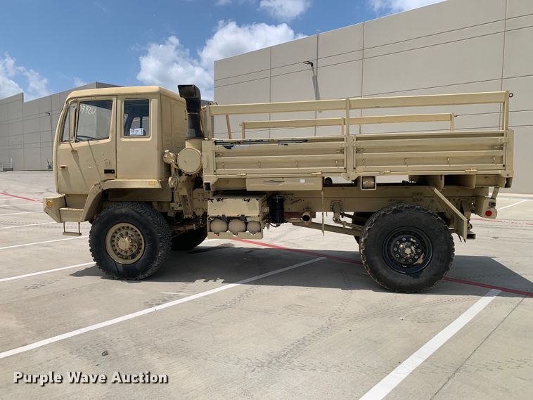 image for item DM7965 1994 Stewart & Stevenson M1078 flatbed truck