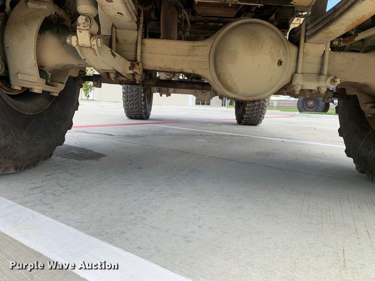 image for item DM7965 1994 Stewart & Stevenson M1078 flatbed truck