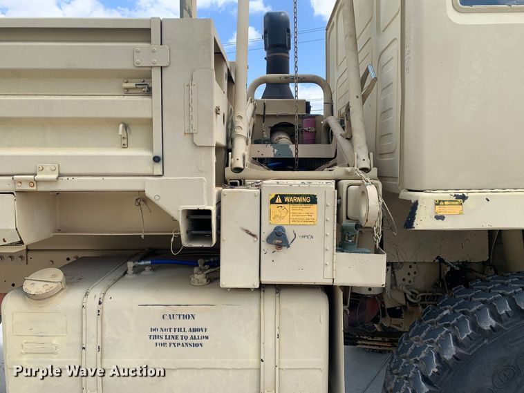 image for item DM7965 1994 Stewart & Stevenson M1078 flatbed truck