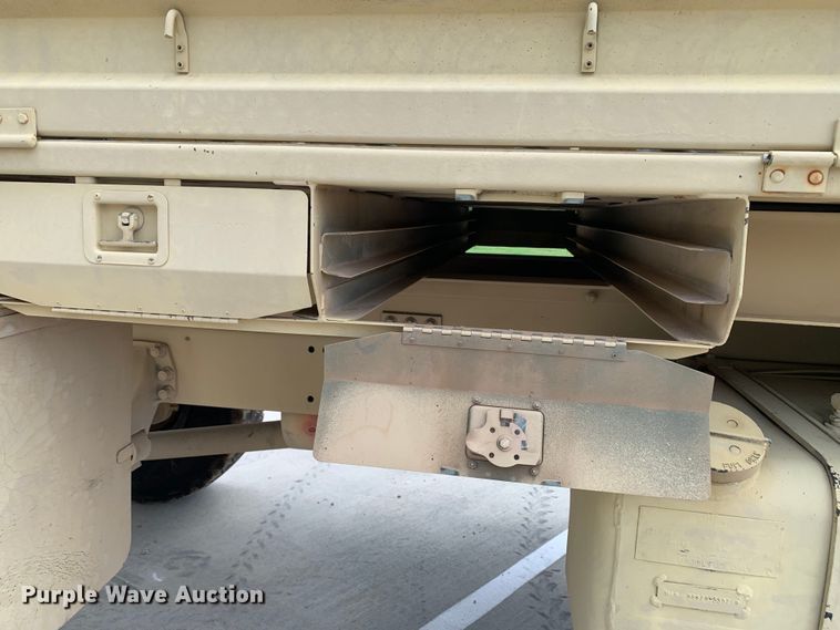 image for item DM7965 1994 Stewart & Stevenson M1078 flatbed truck