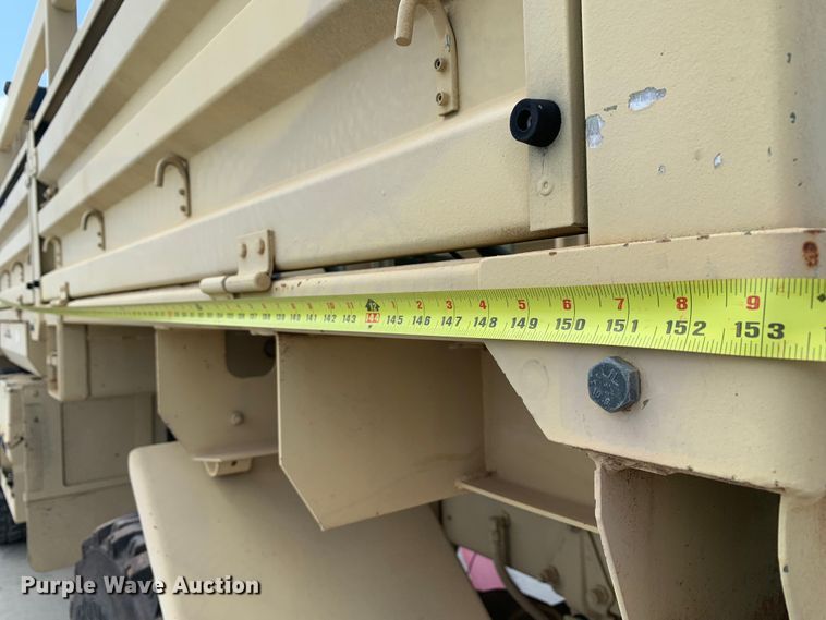 image for item DM7965 1994 Stewart & Stevenson M1078 flatbed truck