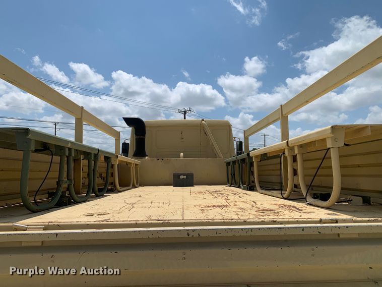 image for item DM7965 1994 Stewart & Stevenson M1078 flatbed truck