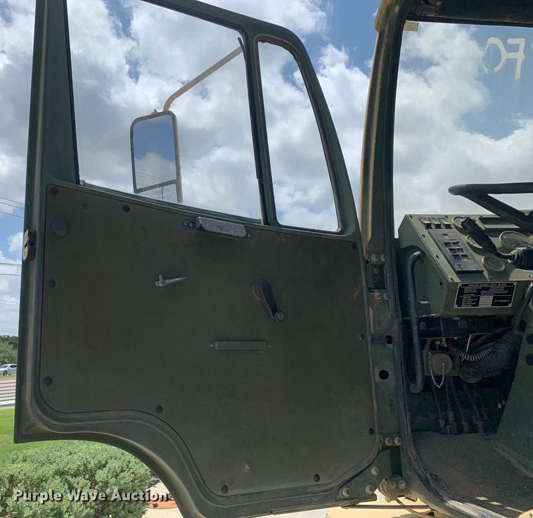 image for item DM7965 1994 Stewart & Stevenson M1078 flatbed truck