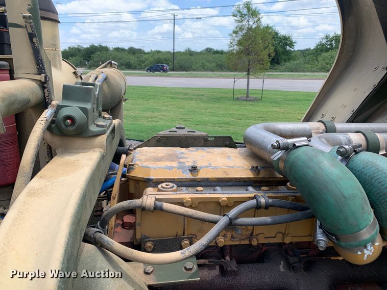 image for item DM7965 1994 Stewart & Stevenson M1078 flatbed truck