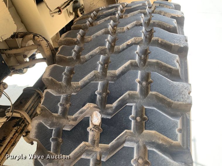 image for item DM7965 1994 Stewart & Stevenson M1078 flatbed truck