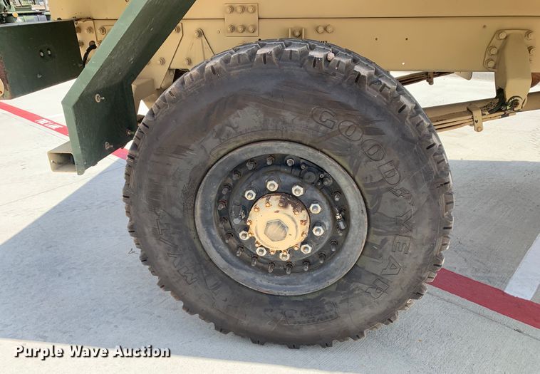 image for item DM7965 1994 Stewart & Stevenson M1078 flatbed truck