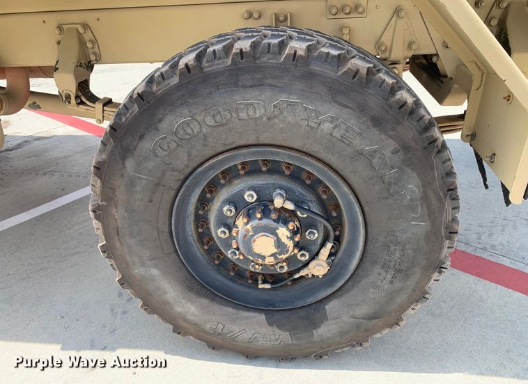 image for item DM7965 1994 Stewart & Stevenson M1078 flatbed truck