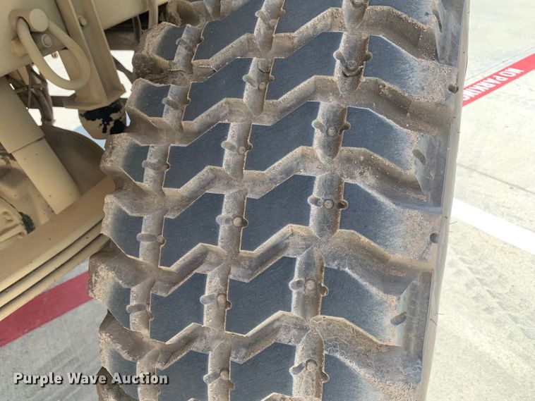 image for item DM7965 1994 Stewart & Stevenson M1078 flatbed truck