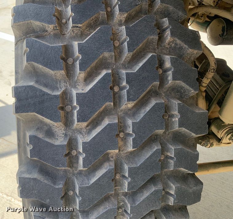 image for item DM7965 1994 Stewart & Stevenson M1078 flatbed truck