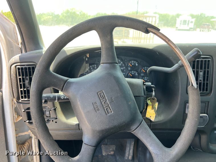 image for item DO2460 2005 GMC C4500 flatbed truck