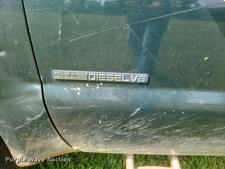 image for item DR4920 2002 Ford F550 Super Duty XLT SuperCab bale bed truck