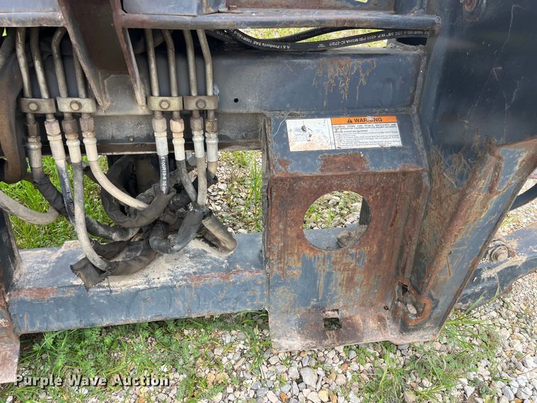 image for item EK8920 Ingersoll-Rand 709 FDS skid steer backhoe