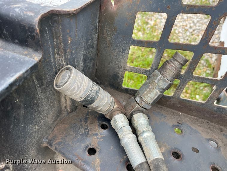 image for item EK8920 Ingersoll-Rand 709 FDS skid steer backhoe