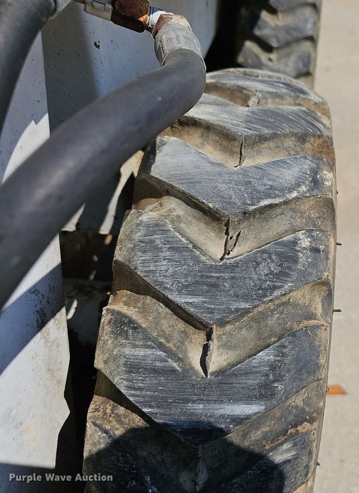 image for item NX9015 1980 Bobcat 310 skid steer loader