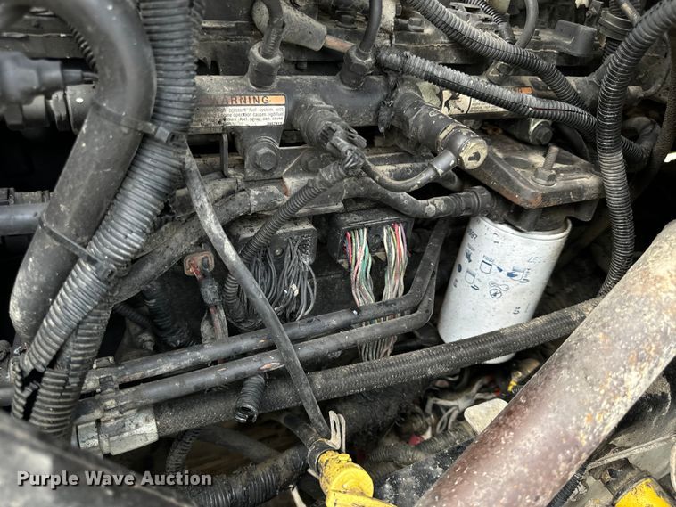 image for item OF9915 2006 Peterbilt 335 roll-off container truck