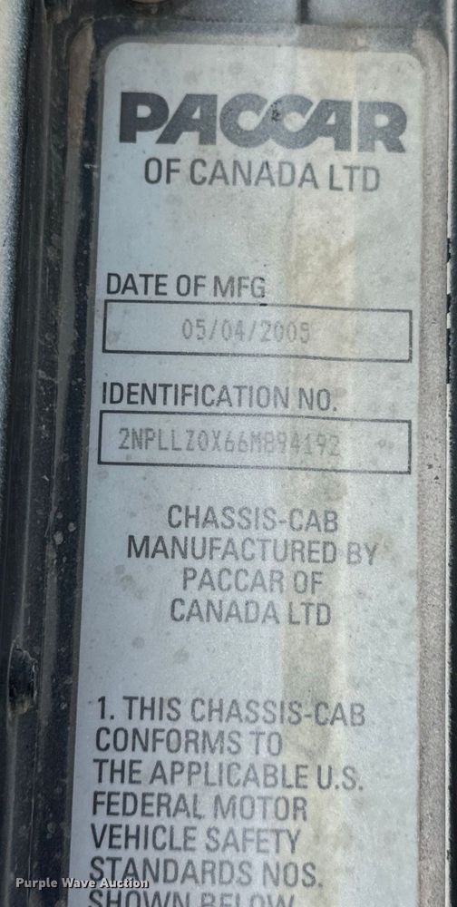 image for item OF9915 2006 Peterbilt 335 roll-off container truck