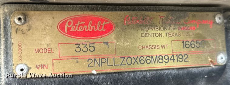 image for item OF9915 2006 Peterbilt 335 roll-off container truck