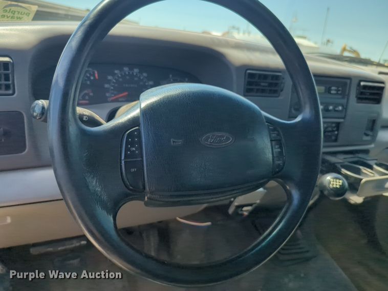 image for item DL1024 2001 Ford F450 Super Duty Crew Cab flatbed truck