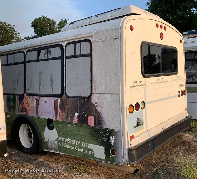 image for item DM1759 2009 International Champion 3200 VT365 shuttle bus