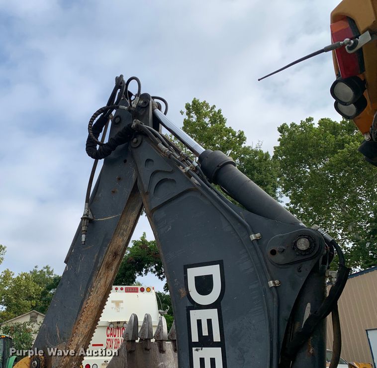 image for item DM1764 2015 John Deere 310L backhoe
