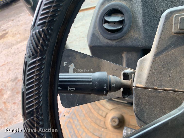 image for item DM1764 2015 John Deere 310L backhoe