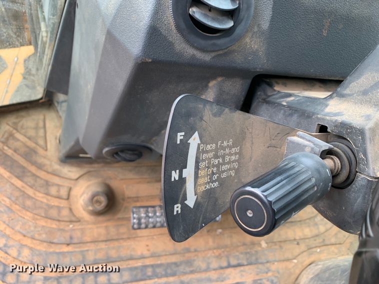 image for item DM1764 2015 John Deere 310L backhoe