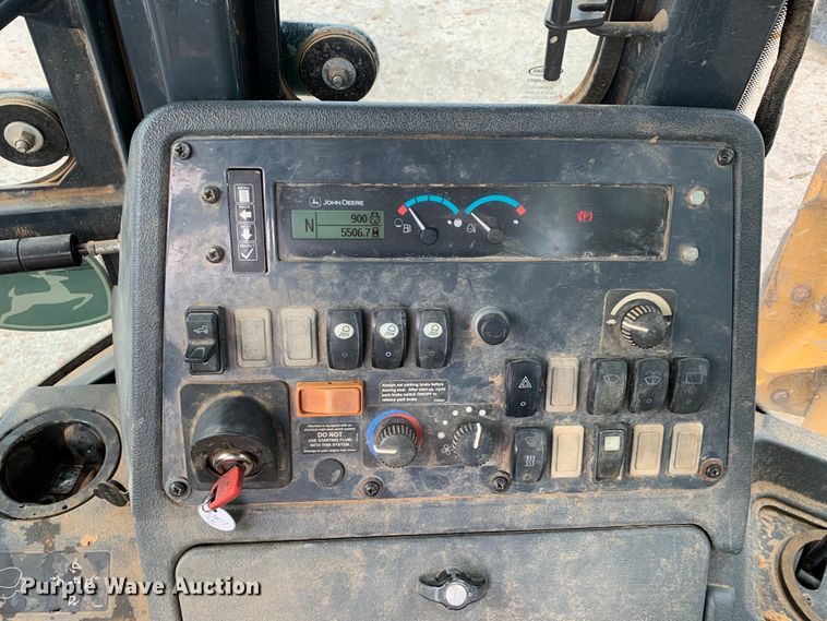 image for item DM1764 2015 John Deere 310L backhoe