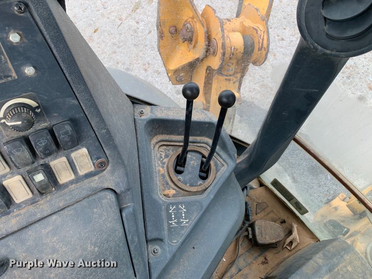 image for item DM1764 2015 John Deere 310L backhoe