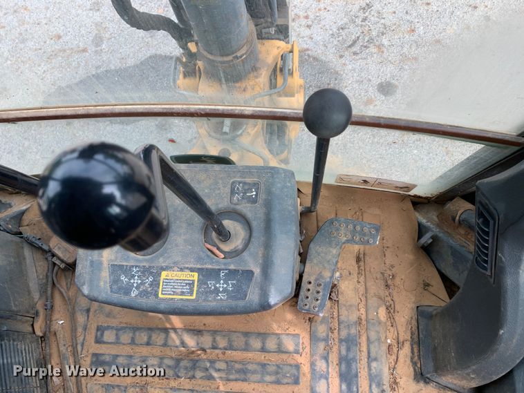 image for item DM1764 2015 John Deere 310L backhoe