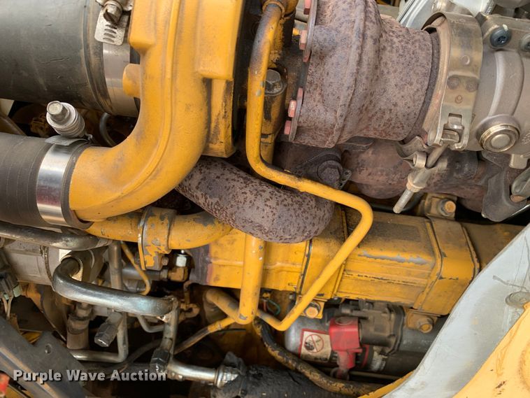 image for item DM1764 2015 John Deere 310L backhoe