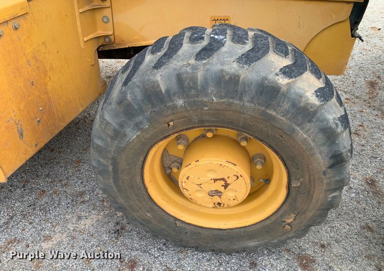 image for item DM1764 2015 John Deere 310L backhoe