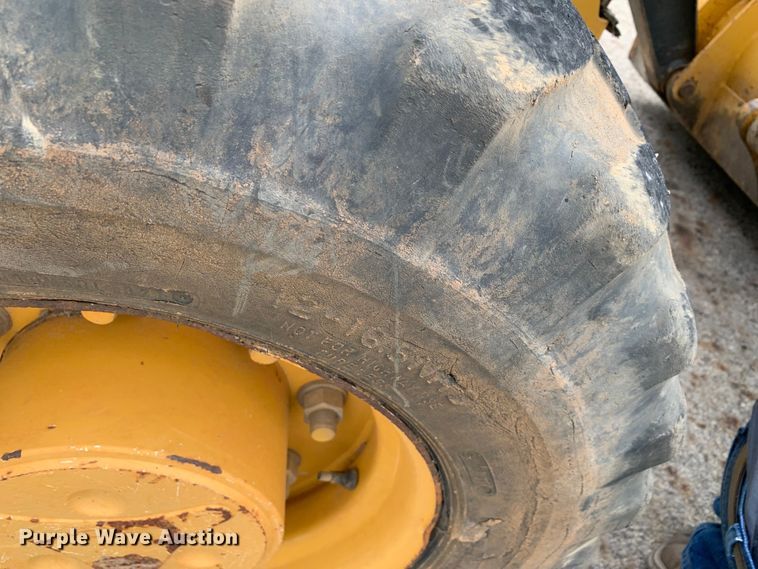 image for item DM1764 2015 John Deere 310L backhoe