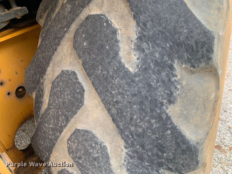 image for item DM1764 2015 John Deere 310L backhoe