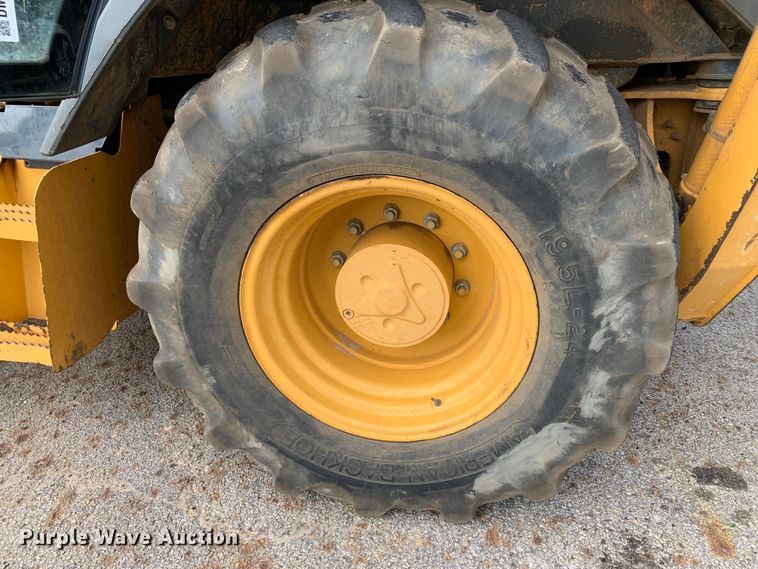 image for item DM1764 2015 John Deere 310L backhoe