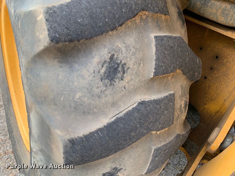 image for item DM1764 2015 John Deere 310L backhoe