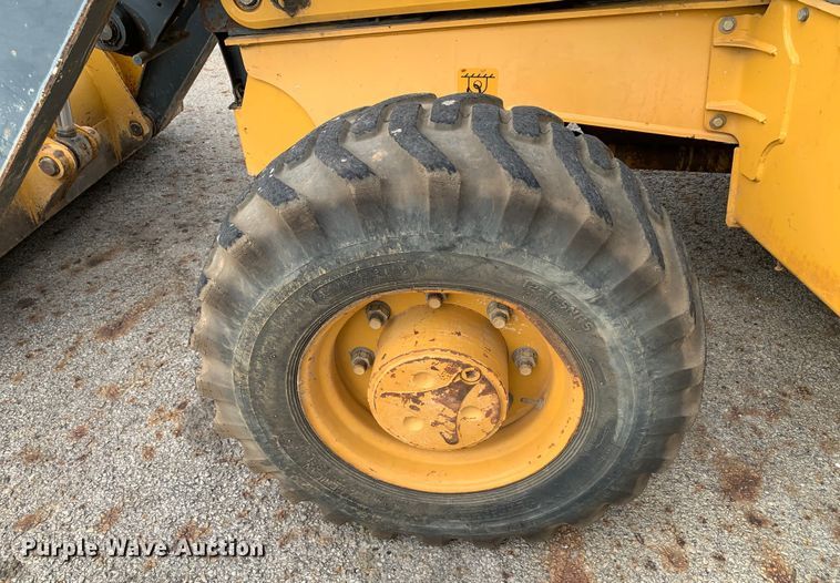 image for item DM1764 2015 John Deere 310L backhoe