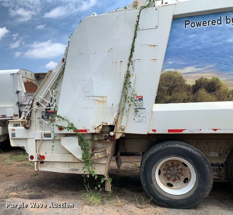 image for item DM1767 2014 Crane Carrier Low Entry refuse truck