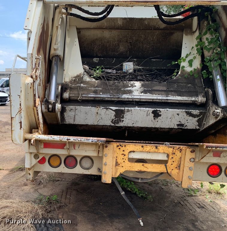 image for item DM1767 2014 Crane Carrier Low Entry refuse truck