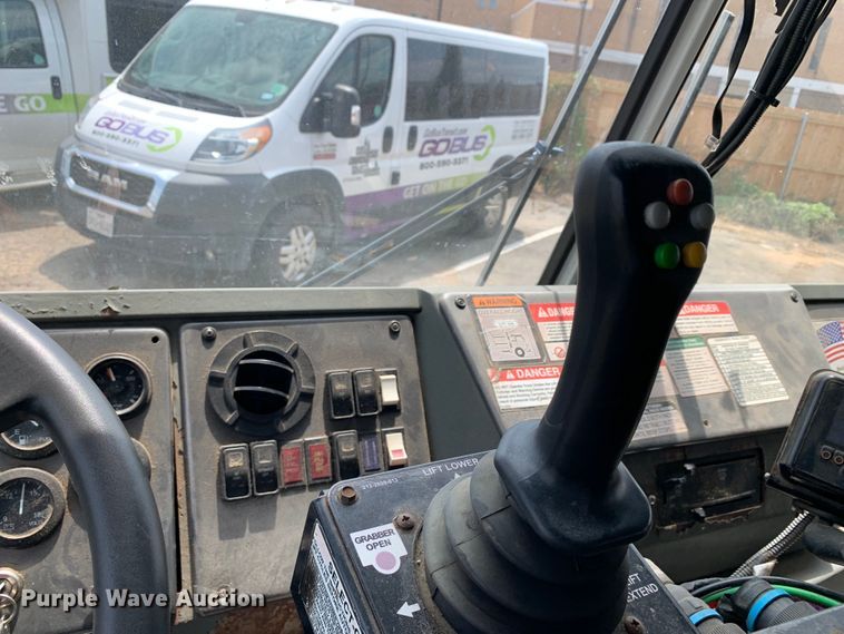 image for item DM1767 2014 Crane Carrier Low Entry refuse truck