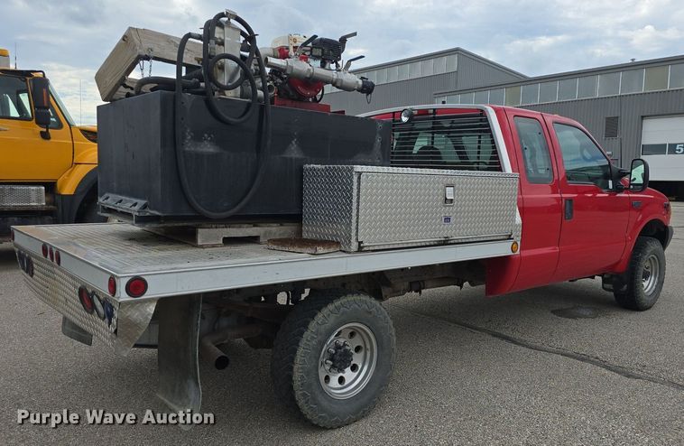 image for item DQ4490 2000 Ford F350 Super Duty XL SuperCab flatbed pickup truck