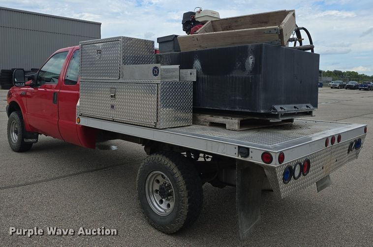 image for item DQ4490 2000 Ford F350 Super Duty XL SuperCab flatbed pickup truck