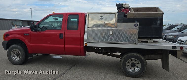 image for item DQ4490 2000 Ford F350 Super Duty XL SuperCab flatbed pickup truck