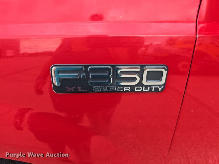 image for item DQ4490 2000 Ford F350 Super Duty XL SuperCab flatbed pickup truck